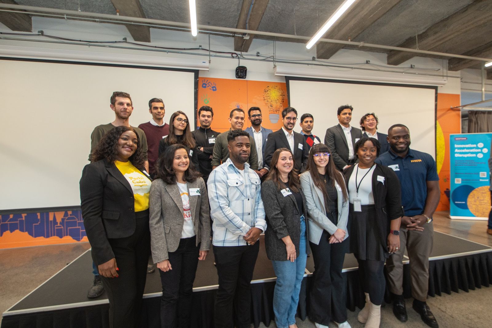The Immigrant Founder Launchpad cohort on stage